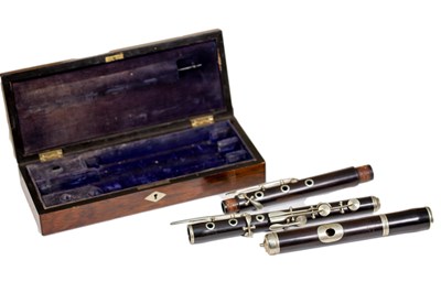 Lot 549 - A 19th Century rosewood flute by Keith Prowse...