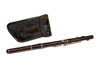 Lot 548 - A 19th Century Cocus wood flute 50cm in length,...