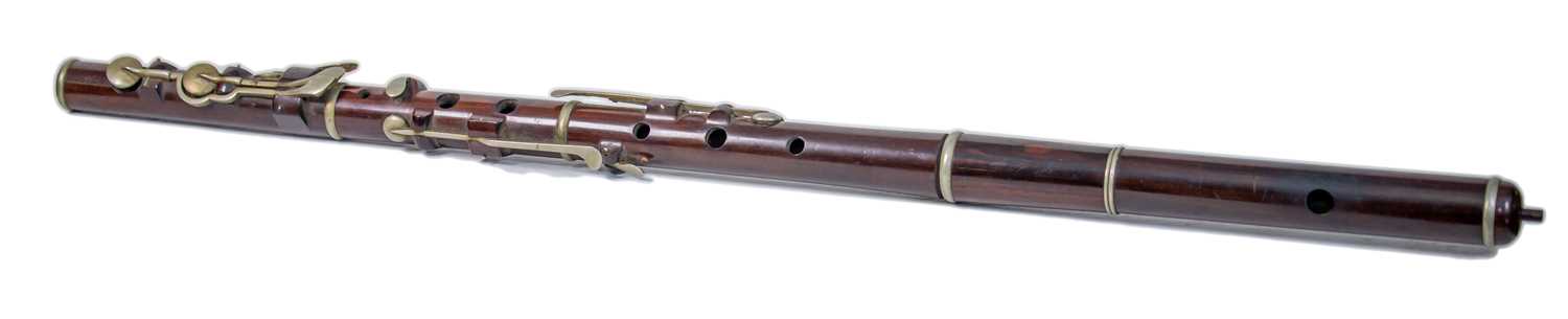 Lot 553 - An early 20th century Cocus wood flute by...