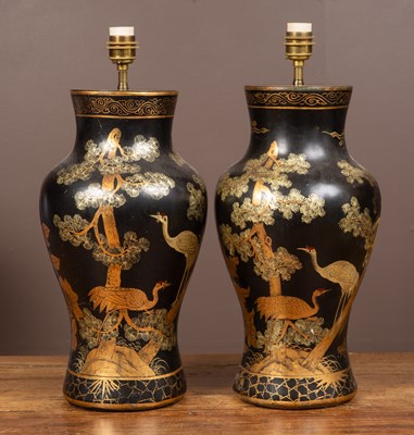 Lot 378 - A pair of black lacquered papier-mâché table lamps