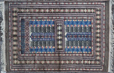 Lot 216 - A modern machine made Afghan style prayer rug