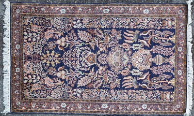 Lot 240 - Two Rugs to Include: A Persian rug; together with a Souf-Style Rug