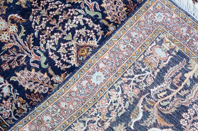 Lot 240 - Two Rugs to Include: A Persian rug; together with a Souf-Style Rug