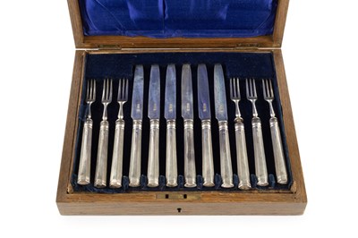 Lot 747 - A set of twelve George V silver dessert knives...