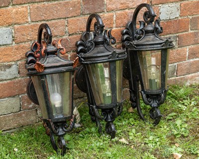 Lot 533 - Three wall mounted metal lanterns