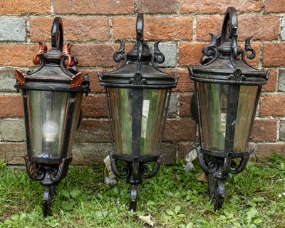 Lot 533 - Three wall mounted metal lanterns