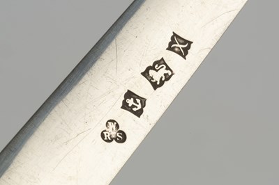 Lot 523 - A silver letter opener, the shaped handle...