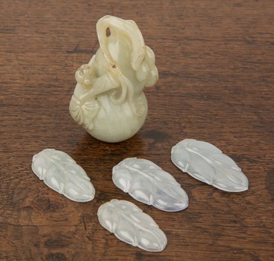 Lot 255 - Four light green/translucent jade carved...