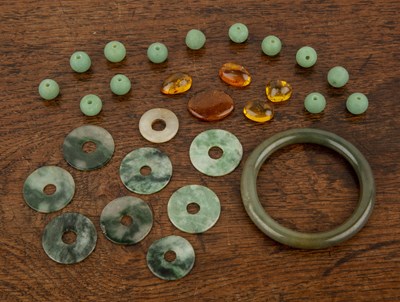 Lot 256 - Various jade and hardstone small bi-discs...