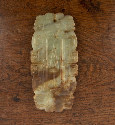 Lot 252 - Green jade archaic style large pendant Chinese,...