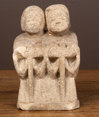 Lot 563 - A small carved limestone sculpture