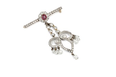 Lot 161 - A ruby and diamond pendant brooch, the...