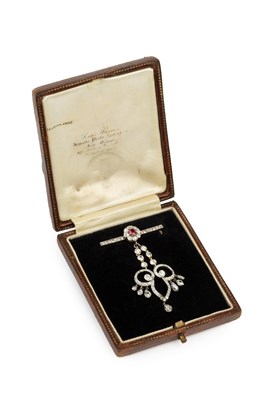 Lot 161 - A ruby and diamond pendant brooch, the...