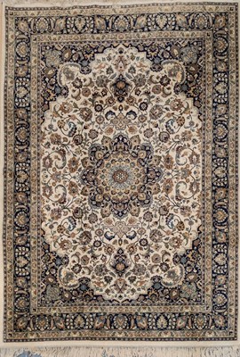 Lot 201 - A late 20th century Indian cream ground carpet...