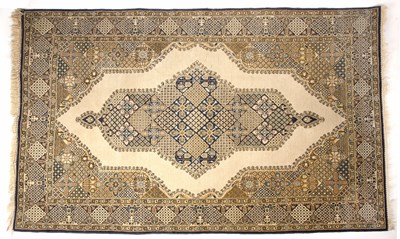 Lot 378 - A middle Eastern Qum yellow and blue ground...