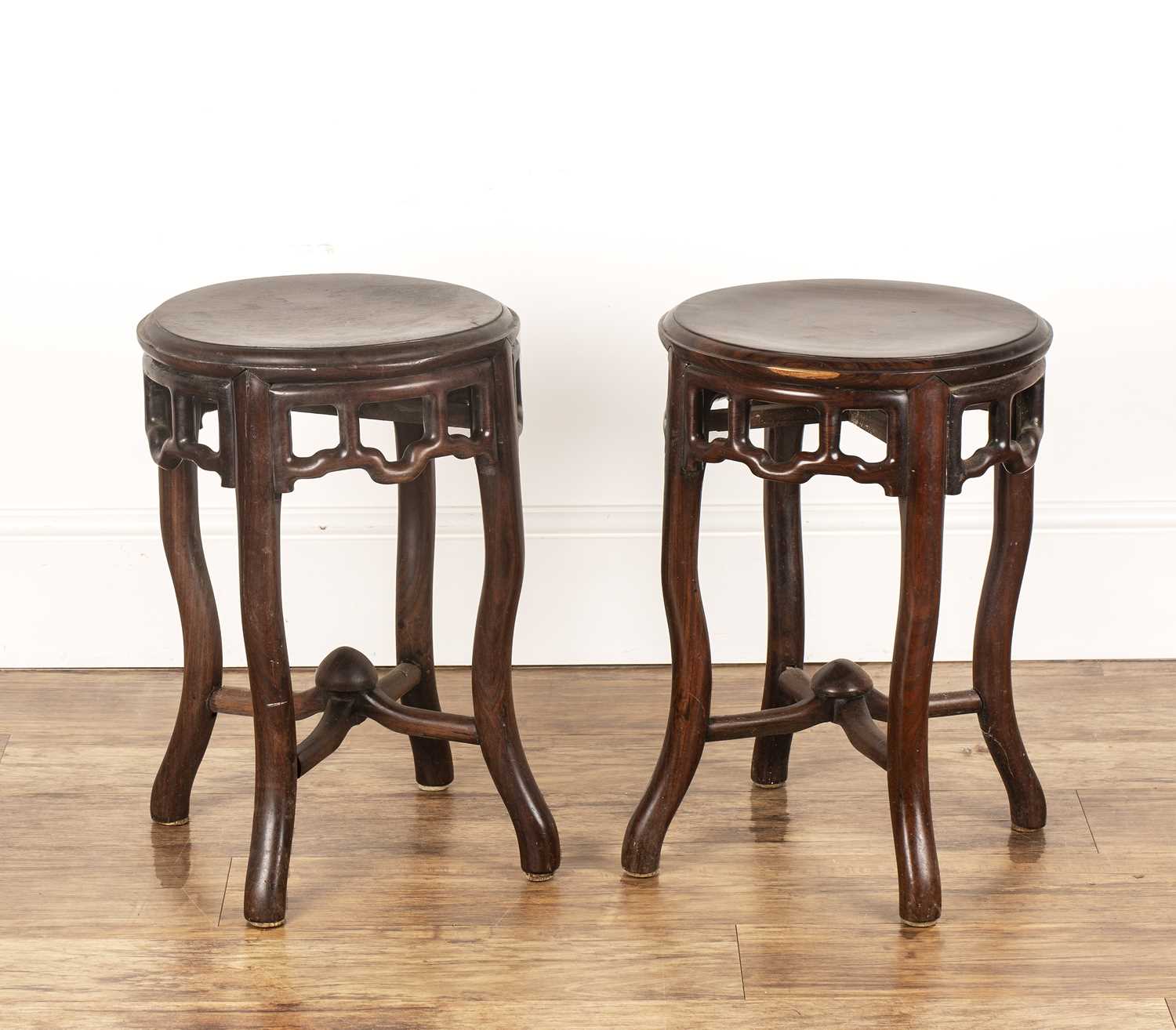 Lot 474 - Pair of circular hardwood stands Chinese each...