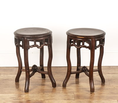 Lot 474 - Pair of circular hardwood stands Chinese each...