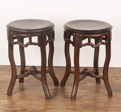 Lot 474 - Pair of circular hardwood stands Chinese each...