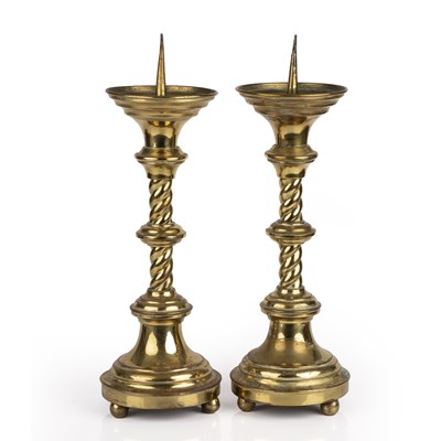 Lot 17 - A pair of brass pricket candlesticks with...