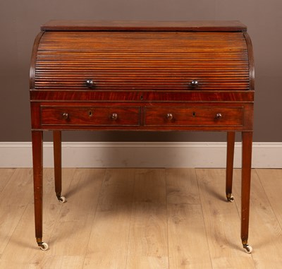 Lot 112 - A 19th century mahogany roll top desk