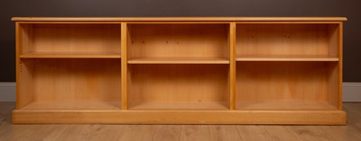 Lot 325 - A modern three section long bookcase