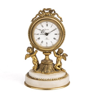 Lot 291 - A Swiza 7 jewels alarm clock, retailed by...