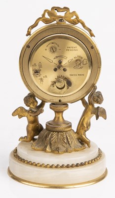 Lot 291 - A Swiza 7 jewels alarm clock, retailed by...