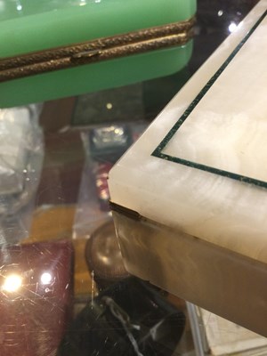 Lot 124 - An English Art Deco onyx box with green stone...