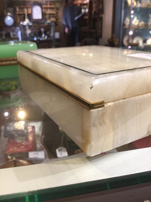 Lot 124 - An English Art Deco onyx box with green stone...