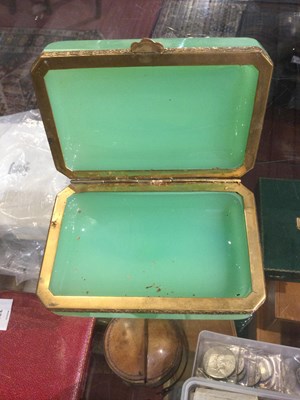 Lot 124 - An English Art Deco onyx box with green stone...