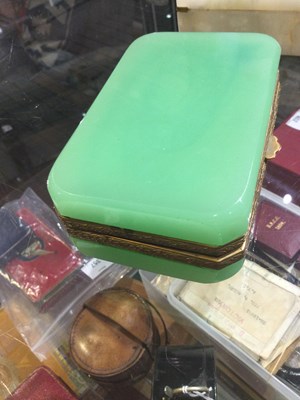 Lot 124 - An English Art Deco onyx box with green stone...
