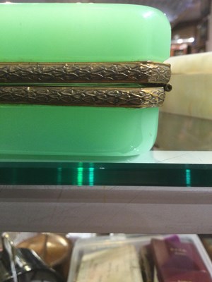 Lot 124 - An English Art Deco onyx box with green stone...