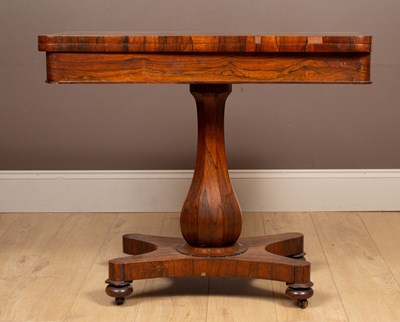 Lot 317 - A Victorian rosewood foldover card table