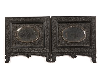 Lot 61 - A pair of 19th century Indian carved ebony...