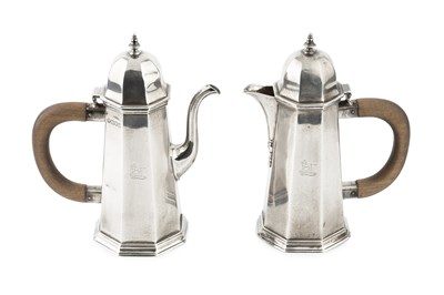 Lot 747 - A pair of Edwardian silver cafe au lait pots,...