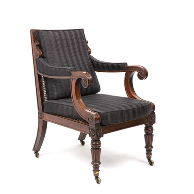 Lot 12 - A William IV mahogany framed bergere armchair...