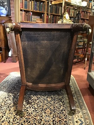 Lot 12 - A William IV mahogany framed bergere armchair...