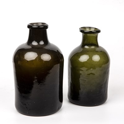 Lot 46 - Two 18th century glass bottles 21cm high and...