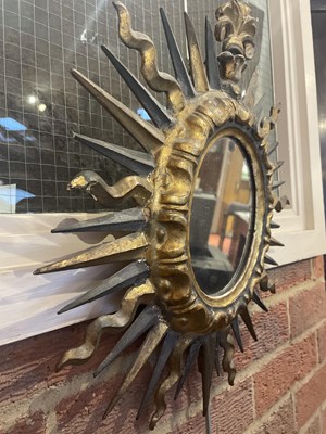 Lot 65 - An antique Spanish gilt sunburst wall mirror...