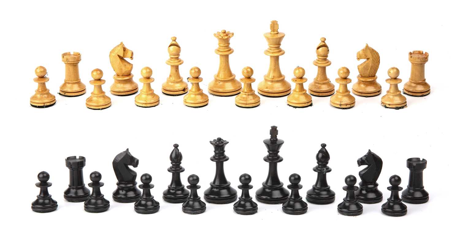 Lot 79 - An ebony and boxwood chess set, the king 6.5cm...