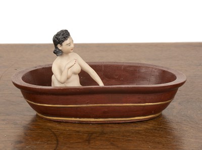 Lot 154 - Model of a lady seated in a bath Chinese,...