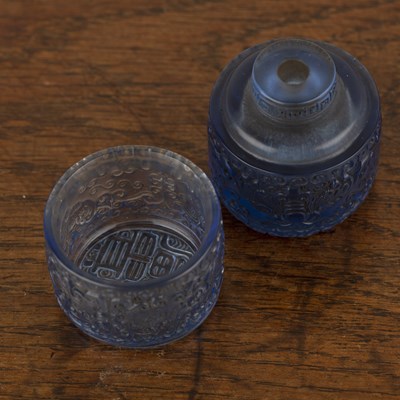 Lot 303 - Pale blue glass cylindrical perfume bottle and...