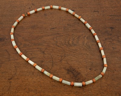 Lot 492 - Pale green jade and Peking glass necklace...