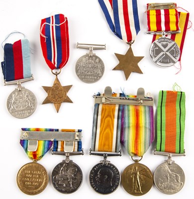 Lot 207 - A group of WWI and WWII campaign medals to...