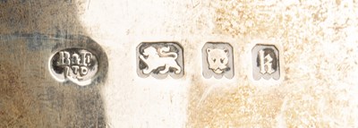 Lot 194 - Two silver trophy cups one with twin leopard...