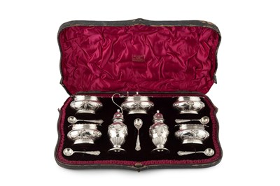 Lot 729 - A late Victorian silver seven piece cruet set,...