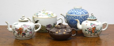 Lot 548 - Four porcelain teapots and a Yixing teapot...