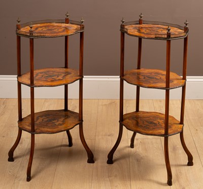 Lot 161 - A pair of three tier occasional tables