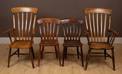 Lot 176 - A set of four dining chairs