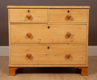 Lot 354 - A pine chest of two short over two long drawers